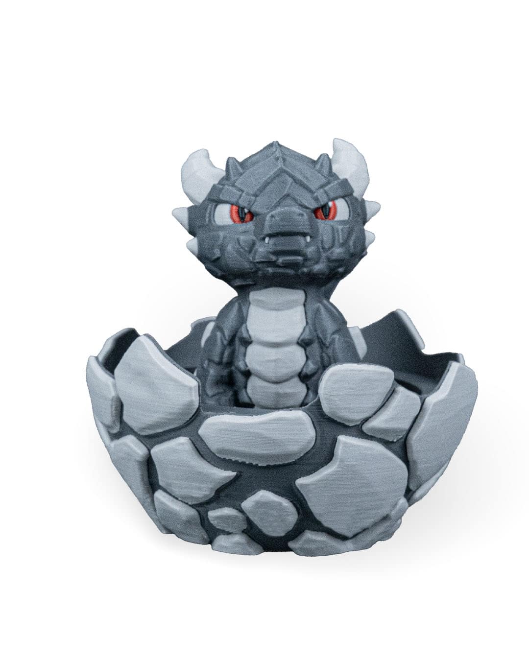 Dragon in egg, gray, stone, cracked, toy