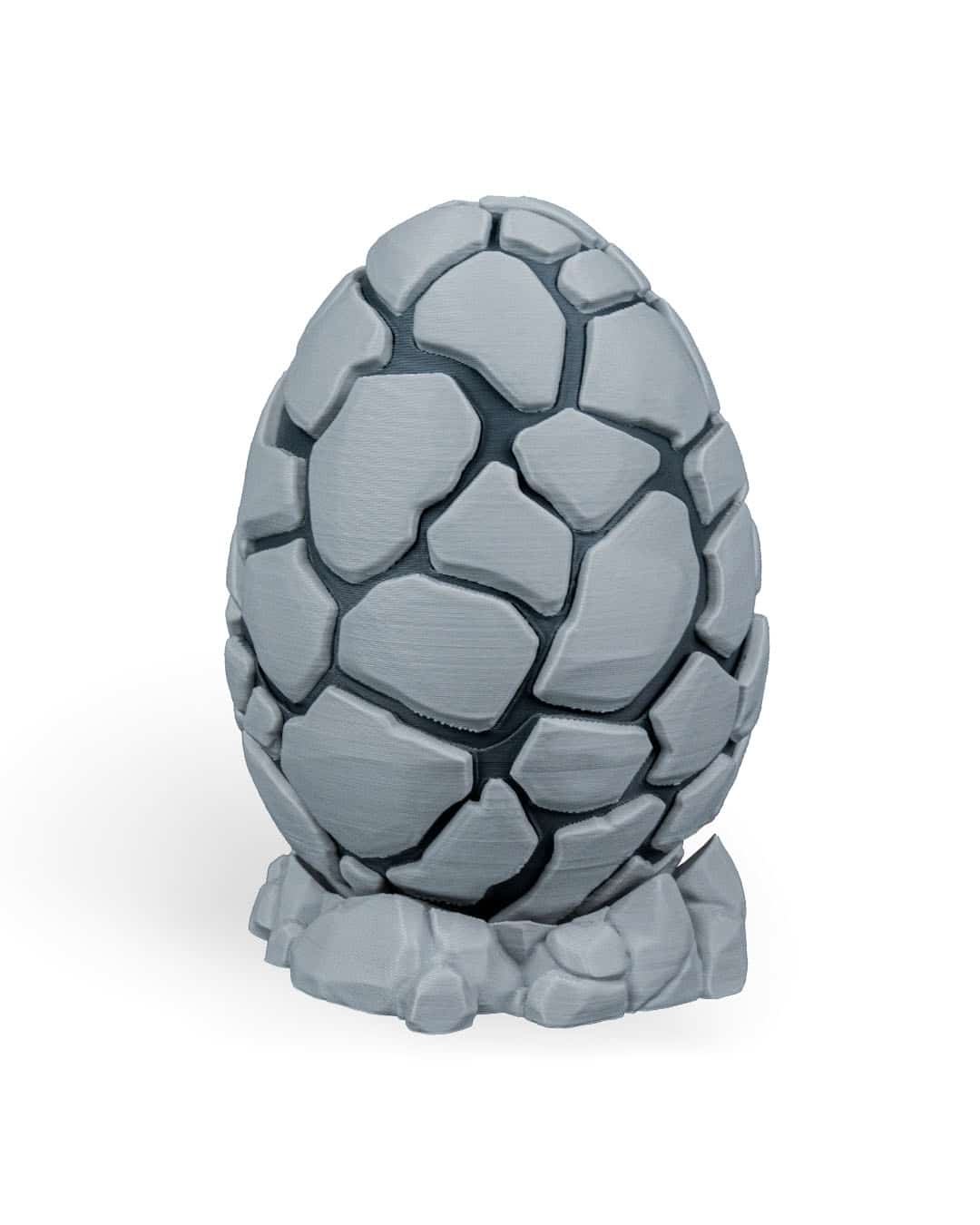 large egg, stone, cracked